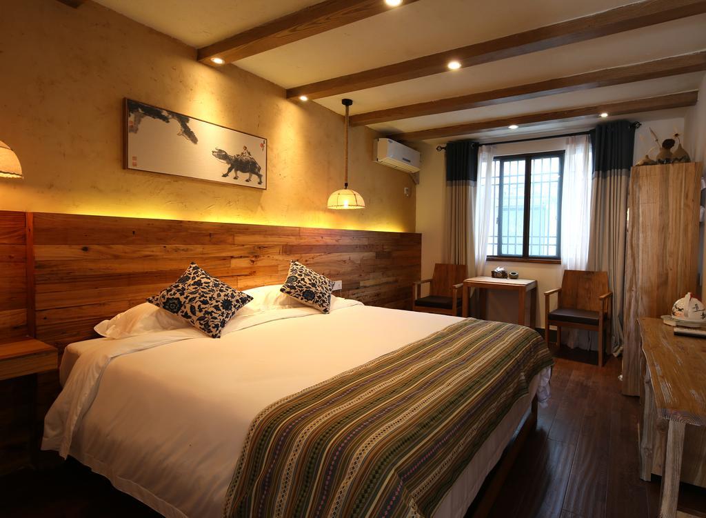 Floral Hotel - Yuexiang Inn Wuzhen Цзясин Экстерьер фото