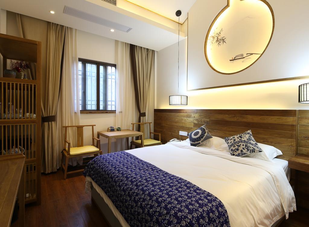 Floral Hotel - Yuexiang Inn Wuzhen Цзясин Экстерьер фото