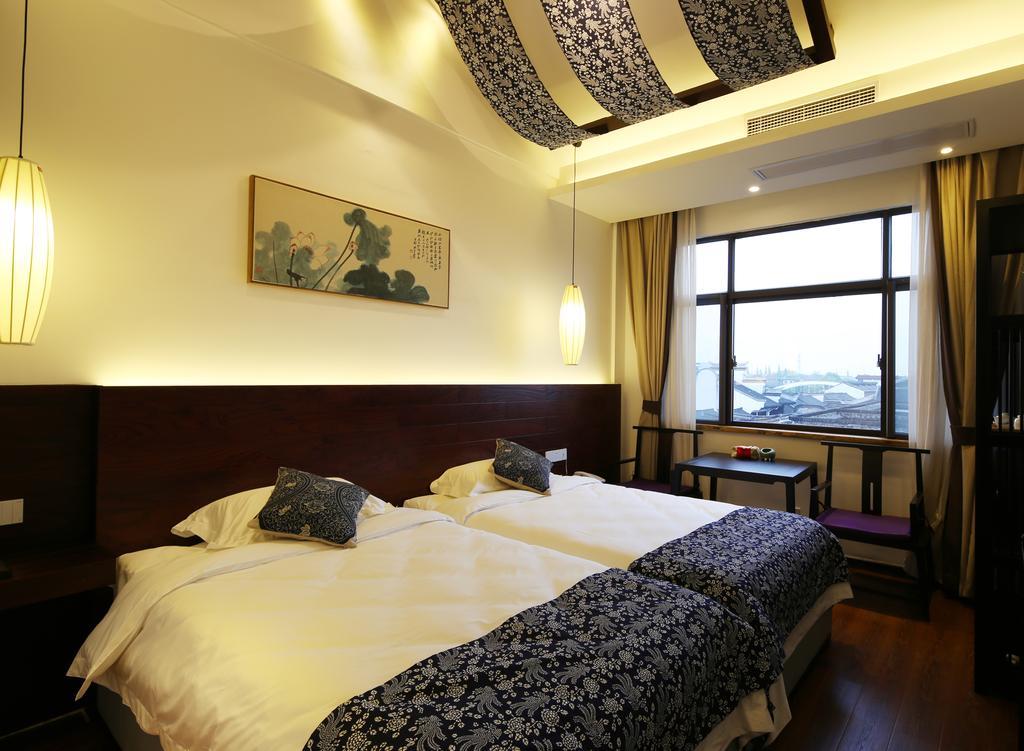 Floral Hotel - Yuexiang Inn Wuzhen Цзясин Экстерьер фото